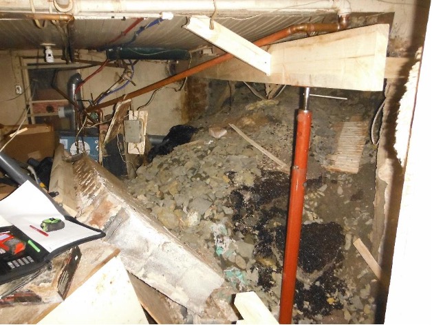 A pile of rubble in a basement 