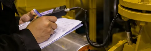 Man writing on notepad