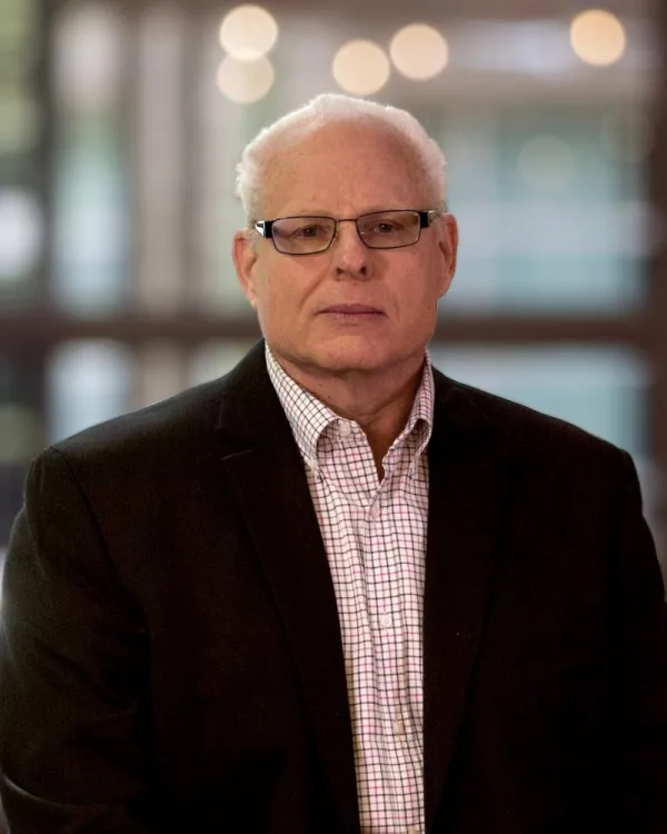 portrait photo of John